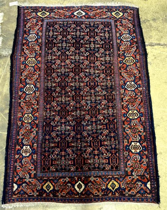 A Senneh blue ground rug, 152 x 99cm